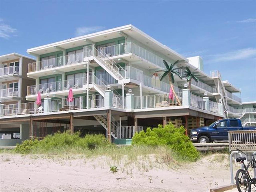 404 EAST DENVER AVENUE  FOUR WINDS CONDOS #401 - WILDWOOD CREST BEACHBLOCK SUMMER VACATION RENTALS with POOLS at WILDWOODRENTS.COM managed by ISLAND REALTY GROUP, NORTH WILDWOOD REALTORS AND VACATION RENTAL MANAGEMENT - This charming property is located in the desirable Beach Block area, just steps away from the sandy shores and crashing waves of the Atlantic Ocean. This cozy 1-bedroom, 1-bathroom unit can comfortably sleep up to 6 guests, making it ideal for families or small groups looking for a relaxing vacation by the sea. Inside, you'll find all the comforts of home, including a kitchen with a microwave, coffee maker, toaster, and toaster oven. A washer and dryer are available for your convenience, along with a shared washer/dryer in the building. Stay cool with wall AC units and enjoy the convenience of high-speed internet and a smart TV for entertainment. Step outside onto the deck and take in the fresh ocean air, or fire up the gas BBQ for a delicious cookout. The heated outdoor pool is perfect for a refreshing dip. Parking is a breeze with 1 designated parking space, and an elevator makes it easy to access your unit. This property is smoke-free and does not allow pets, ensuring a clean and comfortable environment for all guests. Experience the best of Wildwood Crest with this fantastic rental property. Book your stay today and start making memories by the beach! North Wildwood Rentals, Wildwood Rentals, Wildwood Crest Rentals and Diamond Beach Rentals in all price ranges for weekly, monthly, seasonal and weekend vacation rentals plus Wildwood real estate sales of homes, condos, vacation and investment properties in and around Wildwood New Jersey. We offer over 400 properties plus exclusive vacation homes so you can book the shore rental of your choice online and guarantee your vacation at the Shore. Rent with confidence at Island Realty Group! Visit www.wildwoodrents.com to book online or call our office at 609.522.4999. Our office at 1701 New Jersey Avenue in North Wildwood is open 7 days a week!