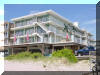 404 EAST DENVER AVENUE  FOUR WINDS CONDOS #401 - WILDWOOD CREST BEACHBLOCK SUMMER VACATION RENTALS with POOLS at WILDWOODRENTS.COM managed by ISLAND REALTY GROUP, NORTH WILDWOOD REALTORS AND VACATION RENTAL MANAGEMENT - This charming property is located in the desirable Beach Block area, just steps away from the sandy shores and crashing waves of the Atlantic Ocean. This cozy 1-bedroom, 1-bathroom unit can comfortably sleep up to 6 guests, making it ideal for families or small groups looking for a relaxing vacation by the sea. Inside, you'll find all the comforts of home, including a kitchen with a microwave, coffee maker, toaster, and toaster oven. A washer and dryer are available for your convenience, along with a shared washer/dryer in the building. Stay cool with wall AC units and enjoy the convenience of high-speed internet and a smart TV for entertainment. Step outside onto the deck and take in the fresh ocean air, or fire up the gas BBQ for a delicious cookout. The heated outdoor pool is perfect for a refreshing dip. Parking is a breeze with 1 designated parking space, and an elevator makes it easy to access your unit. This property is smoke-free and does not allow pets, ensuring a clean and comfortable environment for all guests. Experience the best of Wildwood Crest with this fantastic rental property. Book your stay today and start making memories by the beach! North Wildwood Rentals, Wildwood Rentals, Wildwood Crest Rentals and Diamond Beach Rentals in all price ranges for weekly, monthly, seasonal and weekend vacation rentals plus Wildwood real estate sales of homes, condos, vacation and investment properties in and around Wildwood New Jersey. We offer over 400 properties plus exclusive vacation homes so you can book the shore rental of your choice online and guarantee your vacation at the Shore. Rent with confidence at Island Realty Group! Visit www.wildwoodrents.com to book online or call our office at 609.522.4999. Our office at 1701 New Jersey Avenue in North Wildwood is open 7 days a week!