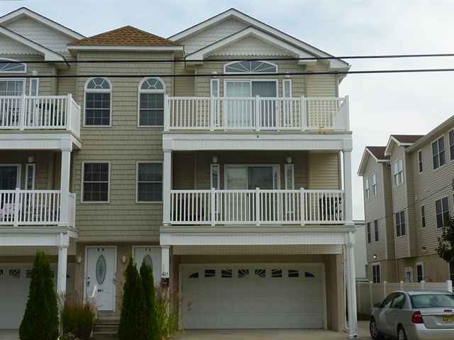 405 EAST 22ND AVENUE - NORTH WILDWOOD SUMMER RENTALS - Three bedroom, two bath vacation home located beach and boardwalk block in North Wildwood. Home offers a full kitchen with range, fridge, icemaker, microwave, coffeemaker, disposal, blender an toaster. Amenities include outside shower, gas grill, central a/c, wifi, washer/dryer, and 3 car off street parking. 