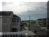 405 EAST 22ND AVENUE - NORTH WILDWOOD SUMMER RENTALS - Three bedroom, two bath vacation home located beach and boardwalk block in North Wildwood. Home offers a full kitchen with range, fridge, icemaker, microwave, coffeemaker, disposal, blender an toaster. Amenities include outside shower, gas grill, central a/c, wifi, washer/dryer, and 3 car off street parking. 
