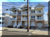 405 EAST 19TH AVENUE #100 - NORTH WILDWOOD BEACHBLOCK SUMMER VACATION RENTALS at WILDWOODRENTS.COM managed by ISLAND REALTY GROUP - Three bedroom, 3 bath vacation home with 1st floor bonus room! Home offers a full kitchen with range, fridge, dishwasher, microwave, toaster and coffeemaker. Amenities include central a/c, washer/dryer, wifi, balcony, 2 car off street parking, outside shower. Sleeps 12; queen, double, 2 twin/twin bunks, 2 double sleep sofas. North Wildwood Rentals, Wildwood Rentals, Wildwood Crest Rentals and Diamond Beach Rentals in all price ranges for weekly, monthly, seasonal and weekend vacation rentals plus Wildwood real estate sales of homes, condos, vacation and investment properties in and around Wildwood New Jersey. We offer over 400 properties plus exclusive vacation homes so you can book the shore rental of your choice online and guarantee your vacation at the Shore. Rent with confidence at Island Realty Group! Visit www.wildwoodrents.com to book online or call our office at 609.522.4999. Our office at 1701 New Jersey Avenue in North Wildwood is open 7 days a week!