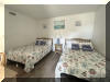 405 OCEAN AVENUE  MEDITERRANEAN #212 - NORTH WILDWOOD BEACHBLOCK SUMMER VACATION RENTALS with POOLS at WILDWOODRENTS.COM - Swim in the pool, walk down the block to the beach, or to the boardwalk for rides and games. Wildwood offers the only free beach at the Jersey shore, and this newly refurbished, two-bedroom condo in quiet North Wildwood is right at the end of the beach block. Its also within walking distance of the boardwalk, about ten blocks away. On the boardwalk, there are three Morey s Piers, each with its own array of carnival rides and games. There s always something for the kids to do. This second floor condo has two double-beds in one bedroom, one in the other, and a pull-out couch, so it can sleep up to 8 people. There are two bathrooms, a living room and a kitchenette. Also a patio to sit and watch the kids frolic in the pool plus a gas BBQ grill. Everything you need for a great summer vacation is right here! North Wildwood Rentals, Wildwood Rentals, Wildwood Crest Rentals and Diamond Beach Rentals in all price ranges for weekly, monthly, seasonal and weekend vacation rentals plus Wildwood real estate sales of homes, condos, vacation and investment properties in and around Wildwood New Jersey. We offer over 400 properties plus exclusive vacation homes so you can book the shore rental of your choice online and guarantee your vacation at the Shore. Rent with confidence at Island Realty Group! Visit www.wildwoodrents.com to book online or call our office at 609.522.4999. Our office at 1701 New Jersey Avenue in North Wildwood is open 7 days a week!