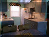 NORTH WILDWOOD RENTALS - 406 E 18th Avenue in North Wildwood - Two bedroom, two bath 1st floor condo located beach block. Newly renovated home offers a kitchen with range, fridge, microwave, toaster, coffeemaker and blender. Amenities include: window a/c, 2 car off street parking, rooftop common deck. Sleeps 6; 2 queen and queen sleep sofa. Doo Wop vibe and decor!