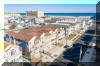 407 EAST 22ND AVENUE #100 - NORTH WILDWOOD BEACHBLOCK SUMMER VACATION RENTALS at WILDWOODRENTS.COM managed by ISLAND REALTY GROUP - Beach and boardwalk block! Four bedroom, three bath, with a full kitchen with range, fridge, dishwasher, disposal, microwave, blender, coffeemaker and toaster. Amenities include central a/c, washer/dryer, balcony, off street parking, wifi. Main floor offers 3 bedrooms, two baths and large great room with kitchen, dining and living areas. Sleeps 10, 1 King and 3 Queens, 2 queen sleep sofas North Wildwood Rentals, Wildwood Rentals, Wildwood Crest Rentals and Diamond Beach Rentals in all price ranges for weekly, monthly, seasonal and weekend vacation rentals plus Wildwood real estate sales of homes, condos, vacation and investment properties in and around Wildwood New Jersey. We offer over 400 properties plus exclusive vacation homes so you can book the shore rental of your choice online and guarantee your vacation at the Shore. Rent with confidence at Island Realty Group! Visit www.wildwoodrents.com to book online or call our office at 609.522.4999. Our office at 1701 New Jersey Avenue in North Wildwood is open 7 days a week!