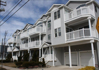 407 EAST 23RD AVENUE - BEACHVIEW CONDOS UNIT A - NORTH WILDWOOD SUMMER VACATION RENTALS - Three bedroom, three bath offers bonus room furnished as 4th bedroom w/handicap access. Located on the beach/boardwalk block in North Wildwood. Vacation home has a full kitchen with range, fridge, dishwasher, coffeemaker, toaster, microwave and blender. Amenities include central a/c, outside shower, balcony, washer/dryer, 3 car off street parking. Sleeps 14; queen, 2 full, 4 twin, and full sleep sofa and queen sleep sofa. North Wildwood Rentals, Wildwood Rentals, Wildwood Crest Rentals and Diamond Beach Rentals in all price ranges for weekly, monthly, seasonal and weekend vacation rentals plus Wildwood real estate sales of homes, condos, vacation and investment properties in and around Wildwood New Jersey. We offer over 400 properties plus exclusive vacation homes so you can book the shore rental of your choice online and guarantee your vacation at the Shore. Rent with confidence at Island Realty Group!