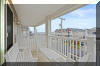 409 EAST 22ND AVENUE  UNIT #3 - BEACH BLOCK NORTH WILDWOOD SUMMER VACATION RENTALS at WILDWOODRENTS.COM - This beautifully decorated condo located in North Wildwood is just steps to the beach and the famous Wildwood Boardwalk. This top floor unit consists of 3 bedrooms and 2 full baths with an upgraded kitchen offering granite counter tops, stainless steel appliances and a large peninsula that easily seats 7. This is a perfect spot to enjoy your family vacation. Additional upgrades include vaulted ceiling, hardwood floors and wainscoting. Living Room opens onto a front deck offering southern exposure. This is where you will enjoy the sun, salt air and fantastic views. Kitchen appliances include range, fridge, ice maker, disposal, dishwasher, coffeemaker, toaster. Additional amenities include central a/c, washer/dryer, 2 car garage, balcony, outside shower. Sleeps 10: queen, 2 full/full bunks with twin trundle and full sleep sofa. North Wildwood Rentals, Wildwood Rentals, Wildwood Crest Rentals and Diamond Beach Rentals in all price ranges for weekly, monthly, seasonal and weekend vacation rentals plus Wildwood real estate sales of homes, condos, vacation and investment properties in and around Wildwood New Jersey. We offer over 400 properties plus exclusive vacation homes so you can book the shore rental of your choice online and guarantee your vacation at the Shore. Rent with confidence at Island Realty Group! Visit www.wildwoodrents.com to book online or call our office at 609.522.4999. Our office at 1701 New Jersey Avenue in North Wildwood is open 7 days a week!