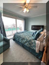 4101 OCEAN AVENUE  OLYMPUS CONDOS #2 - WILDWOOD BEACHBLOCK SUMMER VACATION RENTALS at WILDWOODRENTS.COM managed by ISLAND REALTY GROUP - Steps from the beach and boardwalk! This beach block property is perfect for a family of up to 7 guests, offering 2 bedrooms and 1 baths to ensure everyone's comfort during your stay. Friday night fireworks visible from the master bedroom balcony! As you step inside, you'll be greeted by a cozy living space featuring modern furnishings and a welcoming atmosphere. The fully equipped kitchen is complete with a dishwasher, microwave, coffee maker, toaster, blender, stove, full-size refrigerator, oven, and all the cooking utensils you need to whip up delicious meals. Enjoy your culinary creations at the dining table or head out to the deck to dine al fresco and soak up the sun. When it's time to rest, retreat to one of the two bedrooms, each furnished with a plush queen bed and equipped with a Smart TV for your viewing pleasure. Additional sleeping arrangements can be found in the queen sofa bed in the living room and the single sofa bed, ensuring that everyone has a comfortable place to lay their head. This property boasts modern amenities such as central AC, high-speed internet, a balcony, 2 car off street parking (1 garage/1 driveway). With the convenience of a washer, dryer, vacuum cleaner, and cleaning service included in the rate, you can focus on making lasting memories with your loved ones. Please note that this property is smoke-free and does not allow pets, ensuring a clean and allergy-friendly environment for all guests. Linens are not provided, so please remember to bring your own. Don't miss out on the opportunity to stay in this beautifully furnished vacation rental in Wildwood Beach Side. Book now and start planning your unforgettable getaway by the beach! Wildwood Rentals, North Wildwood Rentals, Wildwood Crest Rentals and Diamond Beach Rentals in all price ranges for weekly, monthly, seasonal and weekend vacation rentals plus Wildwood real estate sales of homes, condos, vacation and investment properties in and around Wildwood New Jersey. We offer over 400 properties plus exclusive vacation homes so you can book the shore rental of your choice online and guarantee your vacation at the Shore. Rent with confidence at Island Realty Group! Visit www.wildwoodrents.com to book online or call our office at 609.522.4999. Our office at 1701 New Jersey Avenue in North Wildwood is open 7 days a week!
