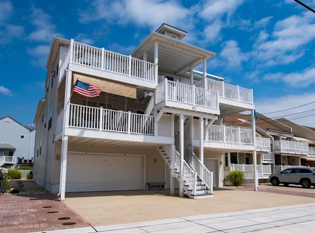 411 EAST 3RD AVENUE UNIT A  NORTH WILDWOOD SUMMMER VACATION RENTAL at WILDWOODRENTS.COM offered by ISLAND REALTY GROUP, NORTH WILDWOOD REALTORS - Three bedroom, 2 bath condo located one block to the beach in North Wildwood. Home offers a full kitchen with range, fridge, dishwasher, disposal, microwave, toaster and coffeemaker. Amenities include central a/c, washer/dryer, balcony, outside shower, wifi and one car off street parking in the driveway. Sleeps 10. Bedroom 1: queen Bedroom 2: full/twin bunk with twin trundle Bedroom 3: twin/twin bunk and twin, and queen sleep sofa. North Wildwood Rentals, Wildwood Rentals, Wildwood Crest Rentals and Diamond Beach Rentals in all price ranges for weekly, monthly, seasonal and weekend vacation rentals plus Wildwood real estate sales of homes, condos, vacation and investment properties in and around Wildwood New Jersey. We offer over 400 properties plus exclusive vacation homes so you can book the shore rental of your choice online and guarantee your vacation at the Shore. Rent with confidence at Island Realty Group! Visit www.wildwoodrents.com to book online or call our office at 609.522.4999. Our office at 1701 New Jersey Avenue in North Wildwood is open 7 days a week!