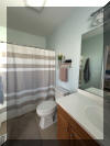 414 EAST 10TH AVENUE - UNIT 8 - NORTH WILDWOOD SUMMER VACTION RENTALS - ISLAND REALTY GROUP - Two story, townhouse style condominium with 3 bedrooms, bonus room, and 3 full baths located on a quiet street just steps from the best North Wildwood beaches! This unit is being totally remodeled during the off season in 2020 with updates in the kitchen, bathrooms, new flooring, window treatments, fresh paint, upgraded smart televisions, new furniture, accent walls, new coffee/wine bar, etc. so pictures are not updated yet. There are TWO outside spaces! A large covered patio on the street level and a large covered deck off the second floor with awesome views of the Atlantic Ocean. Both outside spaces are fully furnished and ready for your party to sit and enjoy morning coffee and/or evening cocktails and everything in between. The 3 bedrooms and 3 baths provide plenty of space for up to ten guests. The first floor is a den or bonus room (serves as 4th BR) with full bathroom. The first floor is perfect for guests who may not want to go up & down stairs that you find at many other "first floor" condos. And talk about LOCATION! Within walking distance to the sea wall, perfect for running and walking! Only 6 blocks from the famous North Wildwood boardwalk! Steps from the best NW beaches! There are plenty of food and restaurant options in the area including a quaint ice cream parlor just down the street and FAMOUS Russo s Deli just around the corner. We think you will find that this unit has everything you need and is perfectly situated in the best area of North Wildwood! We hope to share our happy place with you and yours! Sleeps 10: 1 King, 1 Queen, 1 Double, 1 Bunk Double, 1 Queen Sleep Sofa, 1 Trundle. North Wildwood Rentals, Wildwood Rentals, Wildwood Crest Rentals and Diamond Beach Rentals in all price ranges for weekly, monthly, seasonal and weekend vacation rentals plus Wildwood real estate sales of homes, condos, vacation and investment properties in and around Wildwood New Jersey. We offer over 400 properties plus exclusive vacation homes so you can book the shore rental of your choice online and guarantee your vacation at the Shore. Rent with confidence at Island Realty Group! Visit www.wildwoodrents.com to book online or call our office at 609.522.4999. Our office at 1701 New Jersey Avenue in North Wildwood is open 7 days a week!