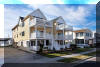 414 EAST 10TH AVENUE - UNIT 8 - NORTH WILDWOOD SUMMER VACTION RENTALS - ISLAND REALTY GROUP - Two story, townhouse style condominium with 3 bedrooms, bonus room, and 3 full baths located on a quiet street just steps from the best North Wildwood beaches! This unit is being totally remodeled during the off season in 2020 with updates in the kitchen, bathrooms, new flooring, window treatments, fresh paint, upgraded smart televisions, new furniture, accent walls, new coffee/wine bar, etc. so pictures are not updated yet. There are TWO outside spaces! A large covered patio on the street level and a large covered deck off the second floor with awesome views of the Atlantic Ocean. Both outside spaces are fully furnished and ready for your party to sit and enjoy morning coffee and/or evening cocktails and everything in between. The 3 bedrooms and 3 baths provide plenty of space for up to ten guests. The first floor is a den or bonus room (serves as 4th BR) with full bathroom. The first floor is perfect for guests who may not want to go up & down stairs that you find at many other "first floor" condos. And talk about LOCATION! Within walking distance to the sea wall, perfect for running and walking! Only 6 blocks from the famous North Wildwood boardwalk! Steps from the best NW beaches! There are plenty of food and restaurant options in the area including a quaint ice cream parlor just down the street and FAMOUS Russo s Deli just around the corner. We think you will find that this unit has everything you need and is perfectly situated in the best area of North Wildwood! We hope to share our happy place with you and yours! Sleeps 10: 1 King, 1 Queen, 1 Double, 1 Bunk Double, 1 Queen Sleep Sofa, 1 Trundle. North Wildwood Rentals, Wildwood Rentals, Wildwood Crest Rentals and Diamond Beach Rentals in all price ranges for weekly, monthly, seasonal and weekend vacation rentals plus Wildwood real estate sales of homes, condos, vacation and investment properties in and around Wildwood New Jersey. We offer over 400 properties plus exclusive vacation homes so you can book the shore rental of your choice online and guarantee your vacation at the Shore. Rent with confidence at Island Realty Group! Visit www.wildwoodrents.com to book online or call our office at 609.522.4999. Our office at 1701 New Jersey Avenue in North Wildwood is open 7 days a week!