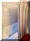414 EAST 17TH AVENUE  UNIT 1 - NORTH WILDWOOD SUMMER VACATION RENTALS at WILDWOODRENTS.COM managed by ISLAND REALTY GROUP - Welcome to your perfect beachside getaway in North Wildwood! This charming property is ideal for a family of up to 7 guests, offering 2 bedrooms and 2 full bathrooms for your comfort and convenience. As you step inside, you'll find a cozy and well-appointed space featuring a variety of sleeping arrangements including a Queen bed, full/twin bunk, and double Sofa bed,. The property is fully furnished and equipped with modern amenities to ensure a relaxing stay. The kitchen is a chef's dream with a dishwasher, microwave, disposal, toaster, blender, stove, full-size refrigerator, oven, Keurig coffee maker, and all the necessary cookware and dinnerware. Whether you're preparing a quick snack or a gourmet meal, you'll find everything you need right at your fingertips. Stay cool and comfortable with central AC and ceiling fans throughout the property. Entertainment options abound with cable TV, high-speed internet, and 2 Smart TVs with streaming services for your viewing pleasure. After a fun day at the beach, rinse off in the convenient outdoor shower and relax on the deck with deck furniture, enjoying the fresh sea breeze. Beach equipment including 4 beach chairs is provided for your enjoyment. Parking is a breeze with 2 designated parking spaces available. This property is smoke-free and does not allow pets. Tenants bring their own linens. A washer/dryer is available for your convenience. Experience the best of North Wildwood from this fantastic beachside retreat. Book your stay today and create unforgettable memories with your loved ones in this beautiful coastal paradise! - North Wildwood Rentals, Wildwood Rentals, Wildwood Crest Rentals and Diamond Beach Rentals in all price ranges for weekly, monthly, seasonal and weekend vacation rentals plus Wildwood real estate sales of homes, condos, vacation and investment properties in and around Wildwood New Jersey. We offer over 400 properties plus exclusive vacation homes so you can book the shore rental of your choice online and guarantee your vacation at the Shore. Rent with confidence at Island Realty Group! Visit www.wildwoodrents.com to book online or call our office at 609.522.4999. Our office at 1701 New Jersey Avenue in North Wildwood is open 7 days a week!