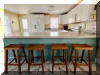 414 EAST 17TH AVENUE  UNIT 1 - NORTH WILDWOOD SUMMER VACATION RENTALS at WILDWOODRENTS.COM managed by ISLAND REALTY GROUP - Welcome to your perfect beachside getaway in North Wildwood! This charming property is ideal for a family of up to 7 guests, offering 2 bedrooms and 2 full bathrooms for your comfort and convenience. As you step inside, you'll find a cozy and well-appointed space featuring a variety of sleeping arrangements including a Queen bed, full/twin bunk, and double Sofa bed,. The property is fully furnished and equipped with modern amenities to ensure a relaxing stay. The kitchen is a chef's dream with a dishwasher, microwave, disposal, toaster, blender, stove, full-size refrigerator, oven, Keurig coffee maker, and all the necessary cookware and dinnerware. Whether you're preparing a quick snack or a gourmet meal, you'll find everything you need right at your fingertips. Stay cool and comfortable with central AC and ceiling fans throughout the property. Entertainment options abound with cable TV, high-speed internet, and 2 Smart TVs with streaming services for your viewing pleasure. After a fun day at the beach, rinse off in the convenient outdoor shower and relax on the deck with deck furniture, enjoying the fresh sea breeze. Beach equipment including 4 beach chairs is provided for your enjoyment. Parking is a breeze with 2 designated parking spaces available. This property is smoke-free and does not allow pets. Tenants bring their own linens. A washer/dryer is available for your convenience. Experience the best of North Wildwood from this fantastic beachside retreat. Book your stay today and create unforgettable memories with your loved ones in this beautiful coastal paradise! - North Wildwood Rentals, Wildwood Rentals, Wildwood Crest Rentals and Diamond Beach Rentals in all price ranges for weekly, monthly, seasonal and weekend vacation rentals plus Wildwood real estate sales of homes, condos, vacation and investment properties in and around Wildwood New Jersey. We offer over 400 properties plus exclusive vacation homes so you can book the shore rental of your choice online and guarantee your vacation at the Shore. Rent with confidence at Island Realty Group! Visit www.wildwoodrents.com to book online or call our office at 609.522.4999. Our office at 1701 New Jersey Avenue in North Wildwood is open 7 days a week!