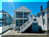 414 EAST 17TH AVENUE  UNIT 1 - NORTH WILDWOOD SUMMER VACATION RENTALS at WILDWOODRENTS.COM managed by ISLAND REALTY GROUP - Welcome to your perfect beachside getaway in North Wildwood! This charming property is ideal for a family of up to 7 guests, offering 2 bedrooms and 2 full bathrooms for your comfort and convenience. As you step inside, you'll find a cozy and well-appointed space featuring a variety of sleeping arrangements including a Queen bed, full/twin bunk, and double Sofa bed,. The property is fully furnished and equipped with modern amenities to ensure a relaxing stay. The kitchen is a chef's dream with a dishwasher, microwave, disposal, toaster, blender, stove, full-size refrigerator, oven, Keurig coffee maker, and all the necessary cookware and dinnerware. Whether you're preparing a quick snack or a gourmet meal, you'll find everything you need right at your fingertips. Stay cool and comfortable with central AC and ceiling fans throughout the property. Entertainment options abound with cable TV, high-speed internet, and 2 Smart TVs with streaming services for your viewing pleasure. After a fun day at the beach, rinse off in the convenient outdoor shower and relax on the deck with deck furniture, enjoying the fresh sea breeze. Beach equipment including 4 beach chairs is provided for your enjoyment. Parking is a breeze with 2 designated parking spaces available. This property is smoke-free and does not allow pets. Tenants bring their own linens. A washer/dryer is available for your convenience. Experience the best of North Wildwood from this fantastic beachside retreat. Book your stay today and create unforgettable memories with your loved ones in this beautiful coastal paradise! - North Wildwood Rentals, Wildwood Rentals, Wildwood Crest Rentals and Diamond Beach Rentals in all price ranges for weekly, monthly, seasonal and weekend vacation rentals plus Wildwood real estate sales of homes, condos, vacation and investment properties in and around Wildwood New Jersey. We offer over 400 properties plus exclusive vacation homes so you can book the shore rental of your choice online and guarantee your vacation at the Shore. Rent with confidence at Island Realty Group! Visit www.wildwoodrents.com to book online or call our office at 609.522.4999. Our office at 1701 New Jersey Avenue in North Wildwood is open 7 days a week!