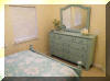 415 EAST STOCKTON ROAD #203 at the OCEAN BREEZE CONDOMINIUMS - Beach block vacation home with 4 bedrooms, two baths located steps from the beach. Full kitchen has range, fridge, icemaker, disposal, dishwasher, microwave, coffeemaker, toaster, blender. Sleeps 10; 2 queen beds, full bed, and 2 twins (bunk), queen sleep sofa. Amenities include central a/c, washer/dryer, elevator, outside shower, pool, and wifi internet. Off street garage parking for 2 cars.