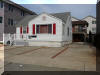 415 EAST 22ND AVENUE #200 - NORTH WILDWOOD SUMMER VACATION RENTALS at WILDWOODRENTS.COM managed by ISLAND REALTY GROUP  SUNDAY to SUNDAY RENTAL - 3 bedroom, 2 bath home located beach/boardwalk block in North Wildwood. Home has a full kitchen with range, fridge, microwave, toaster and coffeemaker. Sleeps 8; 2 queen, 2 full. Amenities include deck, gas bbq, central a/c, wifi, washer/dryer, wifi,2 car off street parking, and outside shower. North Wildwood Rentals, Wildwood Rentals, Wildwood Crest Rentals and Diamond Beach Rentals in all price ranges for weekly, monthly, seasonal and weekend vacation rentals plus Wildwood real estate sales of homes, condos, vacation and investment properties in and around Wildwood New Jersey. We offer over 400 properties plus exclusive vacation homes so you can book the shore rental of your choice online and guarantee your vacation at the Shore. Rent with confidence at Island Realty Group! Visit www.wildwoodrents.com to book online or call our office at 609.522.4999. Our office at 1701 New Jersey Avenue in North Wildwood is open 7 days a week!