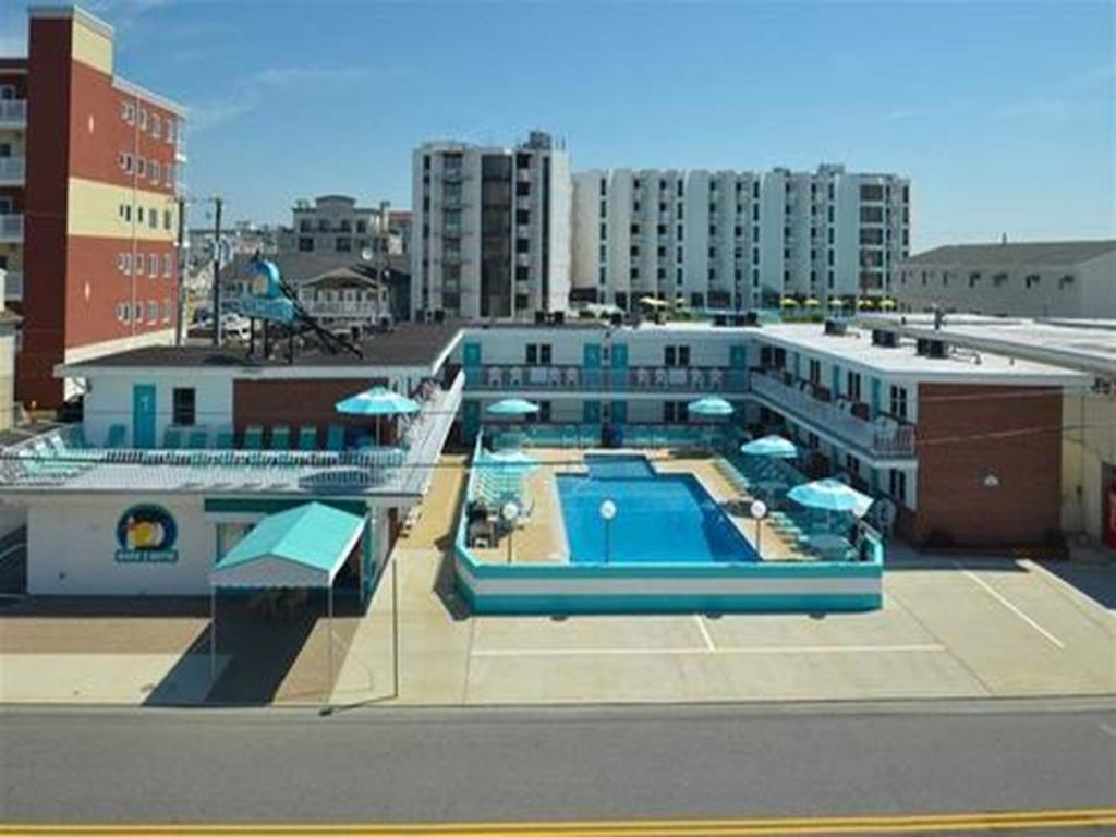 415 EAST ATLANTA AVENUE  OCEANS 7 MARK 1 CONDOS #204 - WILDWOOD CREST BEACHBLOCK SUMMER VACATION RENTALS with POOLS at WILDWOODRENTS.COM - One bedroom, one bath condo located beach block in Wildwood Crest. Home offers a full kitchen with range, fridge, microwave, toaster and coffee maker. Sleeps 6, full in bedroom, full and full sleep sofa in living area. Amenities include pool, gas grill, balcony, coin-op washer/dryer, and one car off street parking. There are 2 smart televisions that can be utilized for free streaming apps or any apps that you can access via your account information. Cable service is not provided. Wildwood Crest Rentals, North Wildwood Rentals, Wildwood Rentals and Diamond Beach Rentals in all price ranges for weekly, monthly, seasonal and weekend vacation rentals plus Wildwood real estate sales of homes, condos, vacation and investment properties in and around Wildwood New Jersey. We offer over 400 properties plus exclusive vacation homes so you can book the shore rental of your choice online and guarantee your vacation at the Shore. Rent with confidence at Island Realty Group! Visit www.wildwoodrents.com to book online or call our office at 609.522.4999. Our office at 1701 New Jersey Avenue in North Wildwood is open 7 days a week!