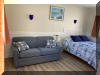 415 EAST ATLANTA AVENUE  OCEAN 7 CONDOS  #203 - WILDWOOD CREST BEACHBLOCK SUMMER VACATION RENTALS with POOLS at WILDWOODRENTS.COM managed by ISLAND REALTY GROUP, CREST WILDWOOD REALTORS AND VACATION RENTAL MANAGEMENT - Welcome to your cozy beachside retreat in Wildwood Crest! This charming property is perfect for a family of up to 4 guests, offering 1 double bed and a double sofa bed to ensure a comfortable stay. Located just steps away from the sandy shores of Wildwood Crest Beach, this studio-style unit features 1 full bathroom, a fully equipped kitchen with a microwave, coffee maker, toaster, stove, oven, and full-size refrigerator. The property also includes central AC, a washer and dryer, iron, and ironing board for your convenience. Enjoy the beautiful ocean views from your private balcony or relax by the outdoor pool on the deck with deck furniture provided. With high-speed internet and cable TV, you can stay connected and entertained during your stay. Parking is a breeze with 1 designated parking space available. This property is smoke-free and does not allow pets, ensuring a clean and comfortable environment for all guests. Experience a worry-free vacation with cleaning included in the rate, and all the essentials provided such as blankets, pillows, pots, pans, silverware, dinnerware, and cooking utensils. Don't miss out on this fantastic opportunity to stay in a fully furnished beachside property in Wildwood Crest. Book now and create unforgettable memories by the shore! Wildwood Crest Rentals, North Wildwood Rentals, Wildwood Rentals and Diamond Beach Rentals in all price ranges for weekly, monthly, seasonal and weekend vacation rentals plus Wildwood real estate sales of homes, condos, vacation and investment properties in and around Wildwood New Jersey. We offer over 400 properties plus exclusive vacation homes so you can book the shore rental of your choice online and guarantee your vacation at the Shore. Rent with confidence at Island Realty Group! Visit www.wildwoodrents.com to book online or call our office at 609.522.4999. Our office at 1701 New Jersey Avenue in North Wildwood is open 7 days a week!