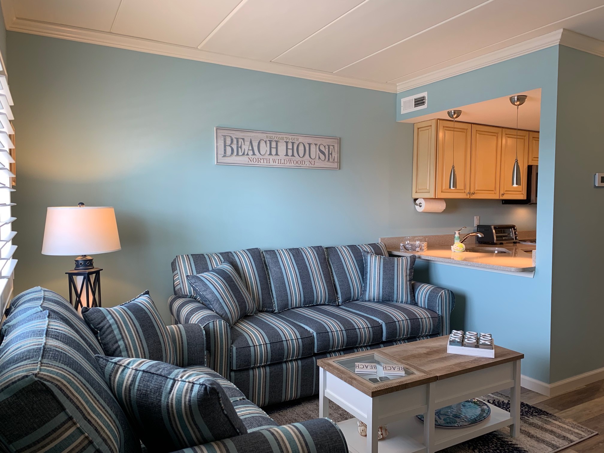 417 EAST 22ND AVENUE - UNIT 301 - WHITE SAILS CONDOMINIUMS NORTH WILDWOOD BEACHBLOCK RENTALS - One bedroom, one bath condo located at the White Sails in North Wildwood. Beach block with a pool. Condo has kitchen with range, fridge, icemaker, stovetop, microwave, coffeemaker, blender and toaster. Amenities include pool, BBQ, outside shower, central a/c, and coin operated washer/dryer. Sleeps 2 full beds, and full sleep sofa. North Wildwood Rentals, Wildwood Rentals, Wildwood Crest Rentals and Diamond Beach Rentals in all price ranges for weekly, monthly, seasonal and weekend vacation rentals plus Wildwood real estate sales of homes, condos, vacation and investment properties in and around Wildwood New Jersey. We offer over 400 properties plus exclusive vacation homes so you can book the shore rental of your choice online and guarantee your vacation at the Shore. Rent with confidence at Island Realty Group!