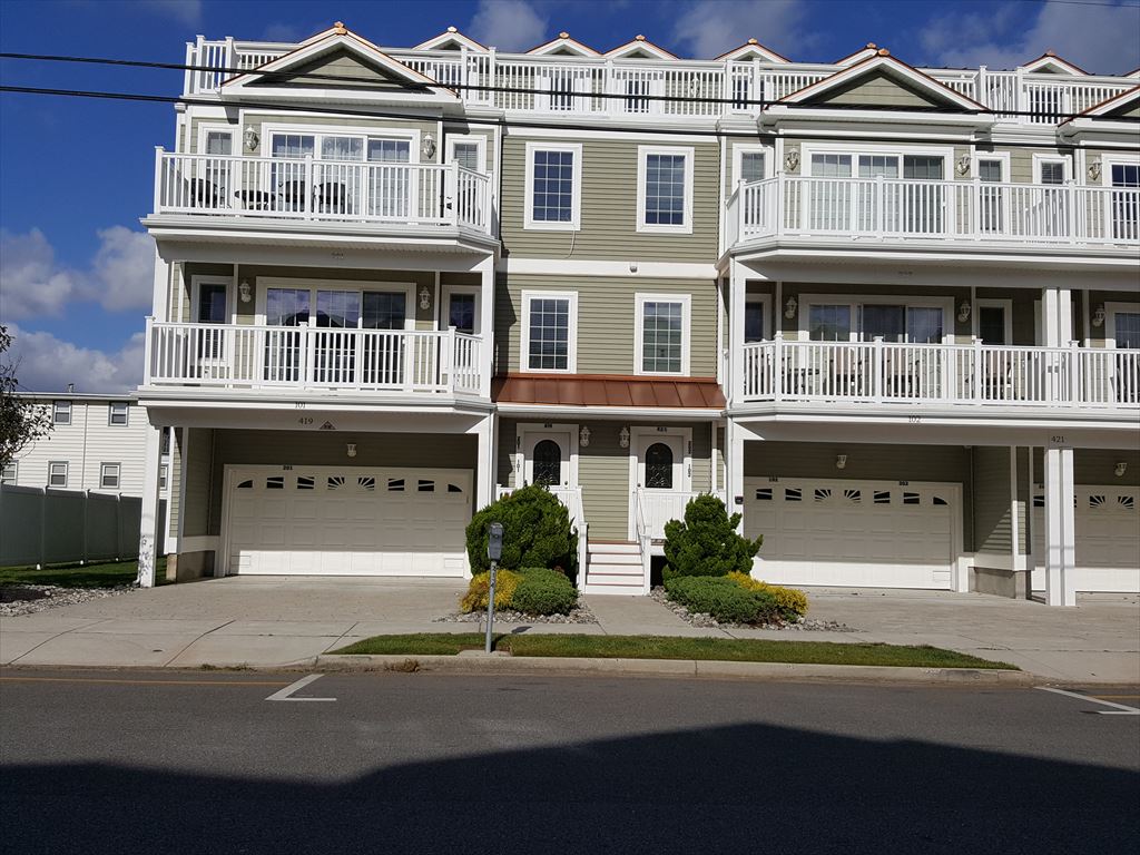 419 EAST 21ST AVENUE #201 - Sans Souci Condominium! Beach block with ocean views and pool in North Wildwood. This rental is on a Sunday to Sunday rental schedule. Four bedroom /two bath home has a spacious floor plan with a spiral staircase leading to the 4th bedroom in the loft. Full kitchen has fridge, range, dishwasher, microwave, disposal, coffeemaker and toaster. Amenities include 2 balconies with ocean view, 1 balcony with pool view, pool, central a/c, washer/dryer, wifi, and 2 car off street parking. Sleeps 14; 5 queen, twin/twin bunk, and full futon. North Wildwood Rentals, Wildwood Rentals, Wildwood Crest Rentals and Diamond Beach Rentals in all price ranges for weekly, monthly, seasonal and weekend vacation rentals plus Wildwood real estate sales of homes, condos, vacation and investment properties in and around Wildwood New Jersey. We offer over 400 properties plus exclusive vacation homes so you can book the shore rental of your choice online and guarantee your vacation at the Shore. Rent with confidence at Island Realty Group!