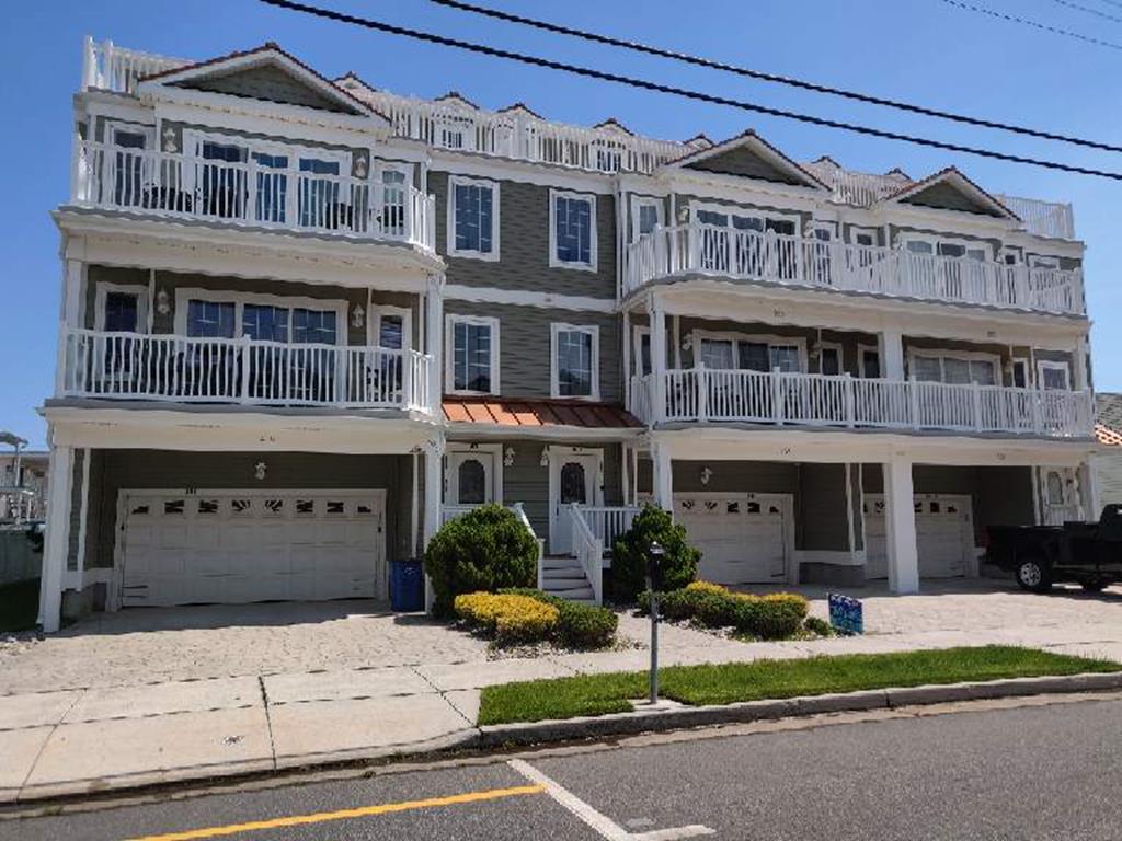 419 EAST 21ST AVENUE #201 - SANS SOUCI CONDOMINIUMS LOCATED BEACHBLOCK IN NORTH WILDWOOD! Beach block with ocean views and pool in North Wildwood. This rental is on a Sunday to Sunday rental schedule. Four bedroom /two bath home has a spacious floor plan with a spiral staircase leading to the 4th bedroom in the loft. Full kitchen has fridge, range, dishwasher, microwave, disposal, coffeemaker and toaster. Amenities include 2 balconies with ocean view, 1 balcony with pool view, pool, central a/c, washer/dryer, wifi, and 2 car off street parking. Sleeps 14; 5 queen, twin/twin bunk, and full futon. North Wildwood Rentals, Wildwood Rentals, Wildwood Crest Rentals and Diamond Beach Rentals in all price ranges for weekly, monthly, seasonal and weekend vacation rentals plus Wildwood real estate sales of homes, condos, vacation and investment properties in and around Wildwood New Jersey. We offer over 400 properties plus exclusive vacation homes so you can book the shore rental of your choice online and guarantee your vacation at the Shore. Rent with confidence at Island Realty Group! Visit www.wildwoodrents.com to book online or call our office at 609.522.4999. Our office at 1701 New Jersey Avenue in North Wildwood is open 7 days a week!