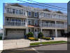 419 EAST 21ST AVENUE #201 - SANS SOUCI CONDOMINIUMS LOCATED BEACHBLOCK IN NORTH WILDWOOD! Beach block with ocean views and pool in North Wildwood. This rental is on a Sunday to Sunday rental schedule. Four bedroom /two bath home has a spacious floor plan with a spiral staircase leading to the 4th bedroom in the loft. Full kitchen has fridge, range, dishwasher, microwave, disposal, coffeemaker and toaster. Amenities include 2 balconies with ocean view, 1 balcony with pool view, pool, central a/c, washer/dryer, wifi, and 2 car off street parking. Sleeps 14; 5 queen, twin/twin bunk, and full futon. North Wildwood Rentals, Wildwood Rentals, Wildwood Crest Rentals and Diamond Beach Rentals in all price ranges for weekly, monthly, seasonal and weekend vacation rentals plus Wildwood real estate sales of homes, condos, vacation and investment properties in and around Wildwood New Jersey. We offer over 400 properties plus exclusive vacation homes so you can book the shore rental of your choice online and guarantee your vacation at the Shore. Rent with confidence at Island Realty Group! Visit www.wildwoodrents.com to book online or call our office at 609.522.4999. Our office at 1701 New Jersey Avenue in North Wildwood is open 7 days a week!