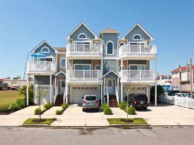 436 East 23rd Avenue - Unit A - BEACHBLOCK - 3 Bedroom 2.5 Bath Condo located at the foot of the boardwalk in North Wildwood. Expansive private covered deck with wonderful views of the beach, boards and ocean.