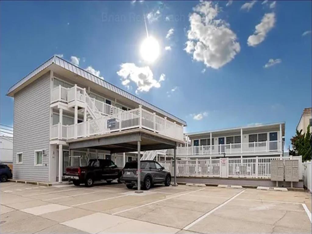 442 EAST 21ST AVENUE � LAMPOST #213 - NORTH WILDWOOD SUMMER VACATION RENTALS with POOLS at WILDWOODRENTS.COM managed by ISLAND REALTY GROUP, NORTH WILDWOOD REALTORS AND VACATION RENTAL MANAGEMENT - Welcome to your cozy beachside retreat in North Wildwood! This charming property is perfect for a family of 4 looking to enjoy a relaxing getaway by the shore. This Studio unit features 1 full bathroom and can comfortably sleep 4 guests. The sleeping arrangements include 1 double bed, 2 single beds(trundle bed), ensuring a restful night's sleep for everyone. Inside, you'll find all the comforts of home, including a well-equipped kitchen with a microwave, coffee maker, toaster oven, stove, and full-size refrigerator. The living area is furnished with a smart TV for entertainment, and high-speed internet is included for your convenience. Step outside onto the deck to soak up the sun or enjoy al fresco dining with deck furniture and a natural gas BBQ grill. The property also offers access to a heated outdoor pool, perfect for a refreshing swim on warm days. Additional amenities include ceiling fans, a washer and dryer (coin-operated), wall AC, parking for 1 vehicle, and an outdoor shower for rinsing off after a day at the beach. The property is smoke-free and does not allow pets. North Wildwood Rentals, Wildwood Rentals, Wildwood Crest Rentals and Diamond Beach Rentals in all price ranges for weekly, monthly, seasonal and weekend vacation rentals plus Wildwood real estate sales of homes, condos, vacation and investment properties in and around Wildwood New Jersey. We offer over 400 properties plus exclusive vacation homes so you can book the shore rental of your choice online and guarantee your vacation at the Shore. Rent with confidence at Island Realty Group! Visit www.wildwoodrents.com to book online or call our office at 609.522.4999. Our office at 1701 New Jersey Avenue in North Wildwood is open 7 days a week!