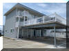 442 EAST 21ST AVENUE - LAMPOST CONDOS #209 - NORTH WILDWOOD SUMMER VACATION RENTALS AT THE BOARDWALK - You can't get much closer than this to the beautiful beach and boardwalk of North Wildwood. 442 EAST 21ST AVENUE - LAMPOST CONDOS #209 - NORTH WILDWOOD BEACHBLOCK SUMMER VACATION RENTALS AT THE BOARDWALK at WILDWOODRENTS.COM  - You can't get much closer than this to the beautiful beach and boardwalk of North Wildwood. Two bedroom, one bath condo located at the Lampost Condominiums in North Wildwood. Unit has a kitchen with stovetop, fridge, microwave, toaster, toaster over Keurig duo/coffeemaker, blender. Amenities include pool, balcony, central a/c, coin op washer/dryer, wifi, and 2 car off street parking. Sleeps 6: queen, full/twin bunk, double sleep sofa. North Wildwood Rentals, Wildwood Rentals, Wildwood Crest Rentals and Diamond Beach Rentals in all price ranges for weekly, monthly, seasonal and weekend vacation rentals plus Wildwood real estate sales of homes, condos, vacation and investment properties in and around Wildwood New Jersey. We offer over 400 properties plus exclusive vacation homes so you can book the shore rental of your choice online and guarantee your vacation at the Shore. Rent with confidence at Island Realty Group! Visit www.wildwoodrents.com to book online or call our office at 609.522.4999. Our office at 1701 New Jersey Avenue in North Wildwood is open 7 days a week!