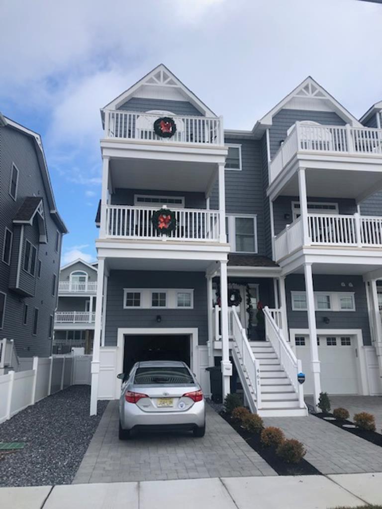 461 EAST 24TH AVENUE - BRAND NEW NORTH WILDWOOD BEACHBLOCK SUMMER VACTION RENTALS - New Construction! Five bedroom, four bath townhouse style vacation home located steps from the beach and boardwalk. Home has a full kitchen with range, fridge, dishwasher, microwave, ice maker, disposal, coffeemaker, blender, crock pot, Keurig, and toaster. Amenities include central a/c, washer, dryer, wifi, outside shower, gas grill, balcony, and 2 car off street parking. Sleeps 12: 1 king, 3 queen, 1 full, 2 twin. North Wildwood Rentals, Wildwood Rentals, Wildwood Crest Rentals and Diamond Beach Rentals in all price ranges for weekly, monthly, seasonal and weekend vacation rentals plus Wildwood real estate sales of homes, condos, vacation and investment properties in and around Wildwood New Jersey. We offer over 400 properties plus exclusive vacation homes so you can book the shore rental of your choice online and guarantee your vacation at the Shore. Rent with confidence at Island Realty Group! Visit www.wildwoodrents.com to book online or call our office at 609.522.4999. Our office at 1701 New Jersey Avenue in North Wildwood is open 7 days a week!