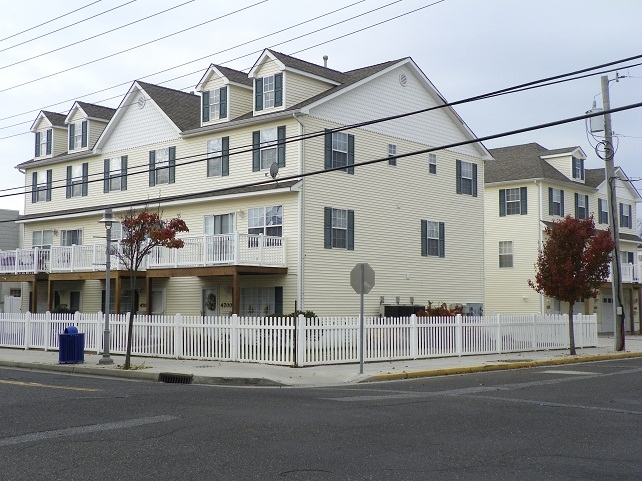 4700 PACIFIC AVENUE - REAR - WILDWOOD SUMMER VACATION RENTALS - 3 bedroom 2.5 bath townhouse style vacation home in Wildwood. Home offers a full kitchen with range, refrigerator, icemaker, dishwasher, disposal, microwave, blender, toaster and coffeemaker. Amenities include central a/c, washer/dryer, wifi, gas bbq, balcony, 2 car garage parking. Sleeps 8; queen, 2 full, and queen sleep sofa. Wildwood Rentals, North Wildwood Rentals, Wildwood Crest Rentals and Diamond Beach Rentals in all price ranges for weekly, monthly, seasonal and weekend vacation rentals plus Wildwood real estate sales of homes, condos, vacation and investment properties in and around Wildwood New Jersey. We offer over 400 properties plus exclusive vacation homes so you can book the shore rental of your choice online and guarantee your vacation at the Shore. Rent with confidence at Island Realty Group!