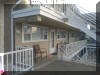 5001 NEW JERSEY AVENUE - HOLLY BEACH CONDOS #206 - WILDWOOD SUMMER VACATION RENTALS WITH POOLS - One bedroom, one bath condo located on the 2nd floor end. Condo has a kitchen with a range, fridge, microwave, toaster and coffee maker. Sleeps 4; 2 double beds and queen sleep sofa. Amenities include: wall a/c, pool, gas bbq, coin operated washer/dryer, one car off street parking. Wildwood Rentals, North Wildwood Rentals, Wildwood Crest Rentals and Diamond Beach Rentals in all price ranges for weekly, monthly, seasonal and weekend vacation rentals plus Wildwood real estate sales of homes, condos, vacation and investment properties in and around Wildwood New Jersey. We offer over 400 properties plus exclusive vacation homes so you can book the shore rental of your choice online and guarantee your vacation at the Shore. Rent with confidence at Island Realty Group!