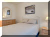 505 EAST 15TH AVENUE #201B - NORTH WILDWOOD BEACHBLOCK SUMMER VACATION RENTALS at WILDWOODRENTS.COM managed by ISLAND REALTY GROUP - Welcome to your perfect beach getaway in North Wildwood! This stunning property, located in North Wildwood, offers everything you need for a relaxing and comfortable stay. With 3 bedrooms and 2 full bathrooms, this spacious rental can accommodate up to 8 guests. The sleeping arrangements include a luxurious king bed, a cozy queen bed, and two double beds, ensuring a good night's sleep for everyone. The property is equipped with modern amenities to make your stay as convenient as possible. Enjoy the fully equipped kitchen with a dishwasher, microwave, toaster, stove, full-size refrigerator, oven, and all the necessary cookware and dinnerware. The central AC will keep you cool on hot summer days, while the washer, dryer, iron, and ironing board provide added convenience. Relax in the comfortable living area with cable TV and high-speed internet, or step out onto the balcony to enjoy the fresh sea breeze. Beach equipment, including chairs and umbrellas, is provided for your convenience. This property is smoke-free and does not allow pets, ensuring a clean and allergy-friendly environment for all guests. The enclosed outside shower is perfect for rinsing off after a day at the beach. With a garage and 2-car garage, parking is a breeze. Additional amenities include a Keurig coffee maker, wireless LAN, smart TVs, and beach essentials such as mattress pads, pillows, and beach chairs. Don't miss out on this fantastic rental in North Wildwood! Book now for the perfect beach vacation with family and friends. North Wildwood Rentals, Wildwood Rentals, Wildwood Crest Rentals and Diamond Beach Rentals in all price ranges for weekly, monthly, seasonal and weekend vacation rentals plus Wildwood real estate sales of homes, condos, vacation and investment properties in and around Wildwood New Jersey. We offer over 400 properties plus exclusive vacation homes so you can book the shore rental of your choice online and guarantee your vacation at the Shore. Rent with confidence at Island Realty Group! Visit www.wildwoodrents.com to book online or call our office at 609.522.4999. Our office at 1701 New Jersey Avenue in North Wildwood is open 7 days a week!