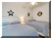 505 EAST 15TH AVENUE #201B - NORTH WILDWOOD BEACHBLOCK SUMMER VACATION RENTALS at WILDWOODRENTS.COM managed by ISLAND REALTY GROUP - Welcome to your perfect beach getaway in North Wildwood! This stunning property, located in North Wildwood, offers everything you need for a relaxing and comfortable stay. With 3 bedrooms and 2 full bathrooms, this spacious rental can accommodate up to 8 guests. The sleeping arrangements include a luxurious king bed, a cozy queen bed, and two double beds, ensuring a good night's sleep for everyone. The property is equipped with modern amenities to make your stay as convenient as possible. Enjoy the fully equipped kitchen with a dishwasher, microwave, toaster, stove, full-size refrigerator, oven, and all the necessary cookware and dinnerware. The central AC will keep you cool on hot summer days, while the washer, dryer, iron, and ironing board provide added convenience. Relax in the comfortable living area with cable TV and high-speed internet, or step out onto the balcony to enjoy the fresh sea breeze. Beach equipment, including chairs and umbrellas, is provided for your convenience. This property is smoke-free and does not allow pets, ensuring a clean and allergy-friendly environment for all guests. The enclosed outside shower is perfect for rinsing off after a day at the beach. With a garage and 2-car garage, parking is a breeze. Additional amenities include a Keurig coffee maker, wireless LAN, smart TVs, and beach essentials such as mattress pads, pillows, and beach chairs. Don't miss out on this fantastic rental in North Wildwood! Book now for the perfect beach vacation with family and friends. North Wildwood Rentals, Wildwood Rentals, Wildwood Crest Rentals and Diamond Beach Rentals in all price ranges for weekly, monthly, seasonal and weekend vacation rentals plus Wildwood real estate sales of homes, condos, vacation and investment properties in and around Wildwood New Jersey. We offer over 400 properties plus exclusive vacation homes so you can book the shore rental of your choice online and guarantee your vacation at the Shore. Rent with confidence at Island Realty Group! Visit www.wildwoodrents.com to book online or call our office at 609.522.4999. Our office at 1701 New Jersey Avenue in North Wildwood is open 7 days a week!