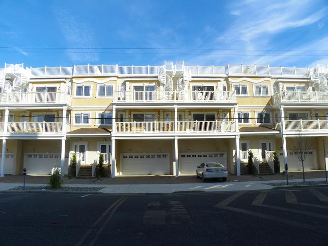 509 EAST 19TH AVENUE  BUCCANEER CONDOS # 103 - NORTH WILDWOOD BEACHBLOCK SUMMER VACATION RENTALS at WILDWOODRENTS.COM - 4 bedroom, 3 bath townhouse located beach block steps to the beach and boardwalk in North Wildwood! Home offers a full kitchen with range, fridge, disposal, dishwasher, microwave, blender and coffeemaker. Amenities include ocean view, central a/c, washer/dryer, balcony, outside shower and 2 car off street parking. Sleeps 10: king, 3 queen, 2 twin. Bonus room set up a separate master bedroom. North Wildwood Rentals, Wildwood Rentals, Wildwood Crest Rentals and Diamond Beach Rentals in all price ranges for weekly, monthly, seasonal and weekend vacation rentals plus Wildwood real estate sales of homes, condos, vacation and investment properties in and around Wildwood New Jersey. We offer over 400 properties plus exclusive vacation homes so you can book the shore rental of your choice online and guarantee your vacation at the Shore. Rent with confidence at Island Realty Group! Visit www.wildwoodrents.com to book online or call our office at 609.522.4999. Our office at 1701 New Jersey Avenue in North Wildwood is open 7 days a week!