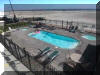 520 EAST STOCKTON ROAD  STOCKTON BEACH HOUSE #204 - WILDWOOD CREST BEACHFRONT SUMMER VACATION RENTALS with POOLS at WILDWOODRENTS.COM managed by ISLAND REALTY GROUP, CREST WILDWOOD REALTORS AND VACATION RENTAL MANAGEMENT - 2 bedroom, 2 bath vacation home located in the Stockton Beach House in Wildwood Crest. Building is located beachfront with the pool facing the ocean! Home has a full kitchen with range, fridge, dishwasher, microwave, blender, icemaker, toaster and coffeemaker. Sleeps 6: queen, full/twin bunk, and twin daybed. Amenities include pool, hot tub, gas grill, internet, central a/c, washer/dryer and two car off street parking. Wildwood Crest Rentals, North Wildwood Rentals, Wildwood Rentals and Diamond Beach Rentals in all price ranges for weekly, monthly, seasonal and weekend vacation rentals plus Wildwood real estate sales of homes, condos, vacation and investment properties in and around Wildwood New Jersey. We offer over 400 properties plus exclusive vacation homes so you can book the shore rental of your choice online and guarantee your vacation at the Shore. Rent with confidence at Island Realty Group! Visit www.wildwoodrents.com to book online or call our office at 609.522.4999. Our office at 1701 New Jersey Avenue in North Wildwood is open 7 days a week!
