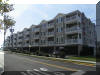 5501 ATLANTIC AVENUE  MONARCH CONDOMINIUMS #112  WILDWOOD CREST SUMMER VACATION RENTALS with POOLS - 4 bedroom, 4 bath vacation home located in the Monarch Condominiums in Wildwood Crest. Condo is an end unit with 2 balconies, one overlooking the pool area, one block to beach, two blocks to boardwalk. Home offers a full kitchen with range, fridge, dishwasher, disposal, microwave, toaster, coffeemaker and blender. Amenities include elevator, 2 pools, 2 hot tubs, 2 childrens pools, outside shower, gas grill, central a/c, washer/dryer, wifi, and 2 car off street parking. Sleeps 9; king, queen, full/twin bunk, 2 twin. Wildwood Crest Rentals, North Wildwood Rentals, Wildwood Rentals and Diamond Beach Rentals in all price ranges for weekly, monthly, seasonal and weekend vacation rentals plus Wildwood real estate sales of homes, condos, vacation and investment properties in and around Wildwood New Jersey. We offer over 400 properties plus exclusive vacation homes so you can book the shore rental of your choice online and guarantee your vacation at the Shore. Rent with confidence at Island Realty Group! Visit www.wildwoodrents.com to book online or call our office at 609.522.4999. Our office at 1701 New Jersey Avenue in North Wildwood is open 7 days a week!