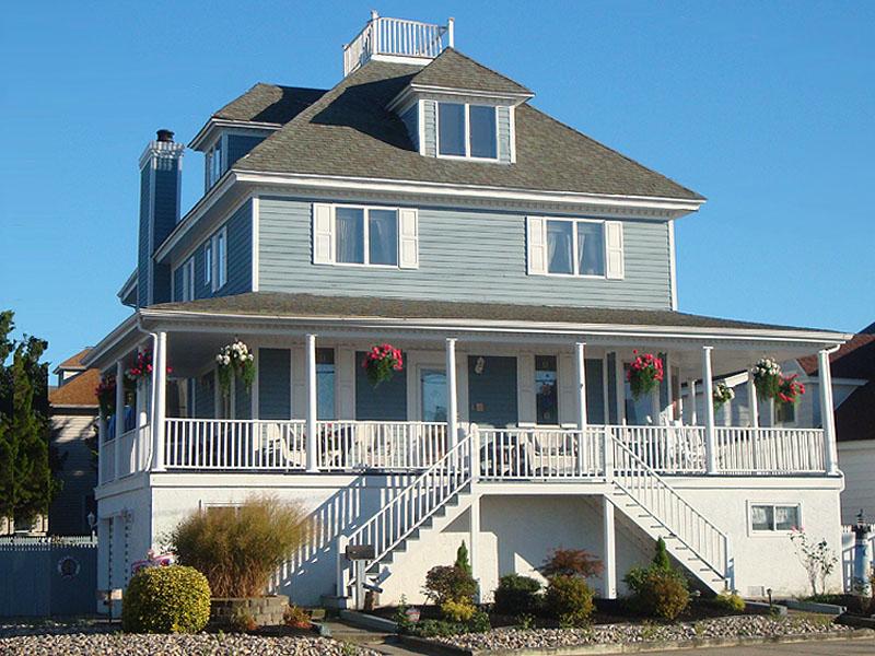 6401 PARK BLVD - WILDWOOD CREST SUMMER VACATION RENTALS with POOLS at WILDWOODRENTS.COM offered by ISLAND REALTY GROUP - 4 Bedroom 4.5 Bath Stately and Classic Victorian Beach home located in the Crest complete with wrap-around porch, private yard, in-ground pool and stunning views of Sunset Lake. Entering the home from the pool area youll find a large family room with TV, Jukebox, Pool Table and full bath. On the second floor is a fully equipped kitchen and eating area overlooking the inviting pool, plus a living room, formal dining room, library and half bath. The third floor offers an expansive Master Bedroom with King bed and en-suite, plus 2 additional queen bedrooms sharing a full bath. The fourth floor has 2 twin beds, a futon and full bath. For a memorable family vacation this home is for you. Sleeps 12; 1 King, 2 Queens, 2 Twins and a Full Futon. Wildwood Crest Rentals, North Wildwood Rentals, Wildwood Rentals and Diamond Beach Rentals in all price ranges for weekly, monthly, seasonal and weekend vacation rentals plus Wildwood real estate sales of homes, condos, vacation and investment properties in and around Wildwood New Jersey. We offer over 400 properties plus exclusive vacation homes so you can book the shore rental of your choice online and guarantee your vacation at the Shore. Rent with confidence at Island Realty Group! Visit www.wildwoodrents.com to book online or call our office at 609.522.4999. Our office at 1701 New Jersey Avenue in North Wildwood is open 7 days a week!