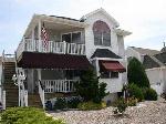 DIAMOND BEACH RENTALS at 201 EAST RALEIGH AVENUE - Comfortable 3 bedroom 2 bath condo located a short stroll to the exclusive beaches of Diamond Beach. Home offers all that is needed for a carefree vacation. Full kitchen, central air, hi-speed internet. Sleeps 6.